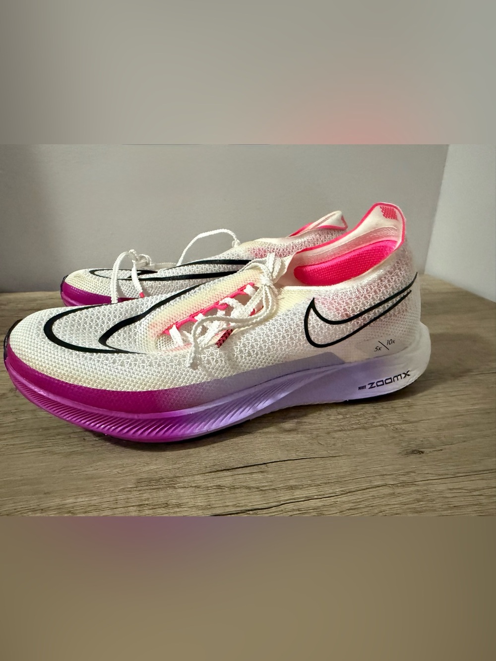 Nike White & Pink Women's Running Shoes with Black Swoosh